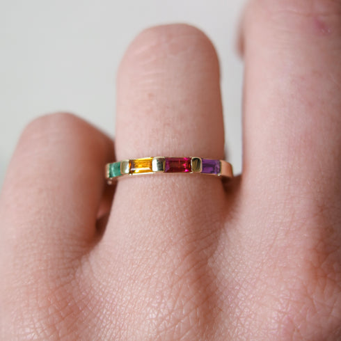 Semi Precious Baguette Half Eternity Band in Yellow Gold