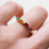 Semi Precious Baguette Half Eternity Band in Yellow Gold