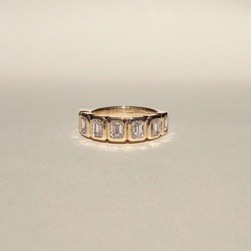 Bezel Set Emerald Cut Diamonds Half Eternity Band