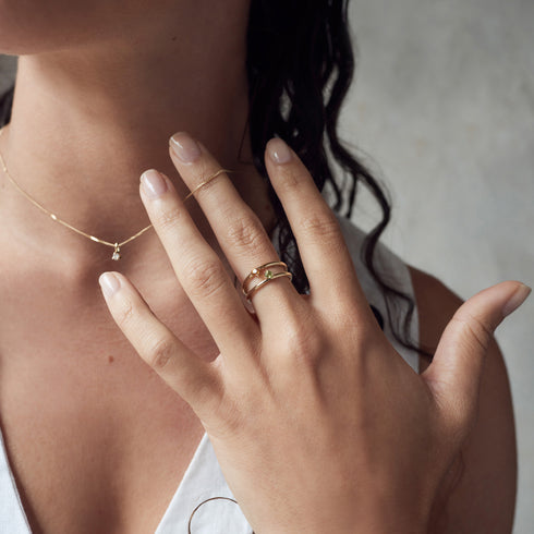 Three Claw Mini Peridot Ring in Yellow Gold