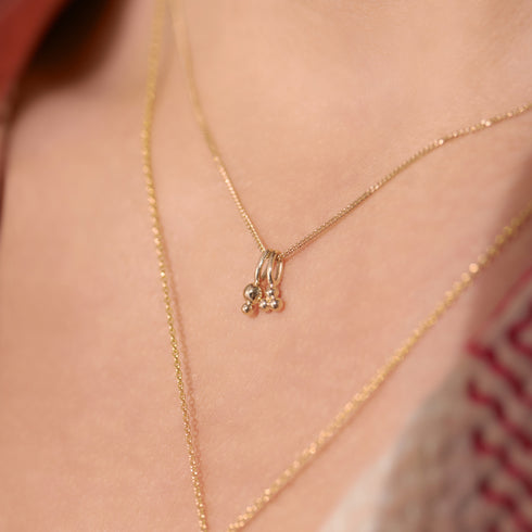The Tres Pendant Charm in Yellow Gold