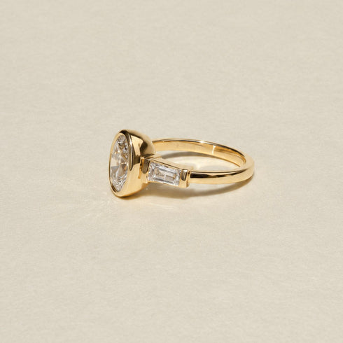 Bezel Set Oval and Tapered Baguette Lab Grown Diamonds Trilogy Ring