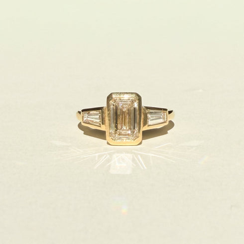 Bezel Set Emerald Lab Grown Diamond Trilogy Ring