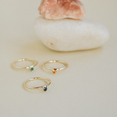 Three Claw Mini Garnet Ring in Yellow Gold