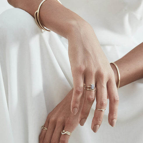 Peachy Red Oval Diamond Ring