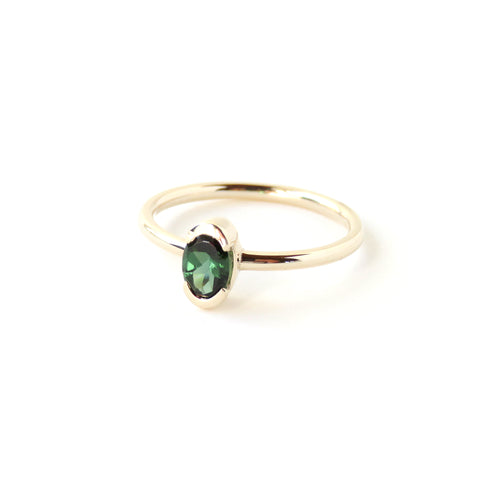 Partial Bezel Set Oval Tourmaline Ring in Yellow Gold