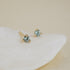 Three Claw Mini Aquamarine Stud Earrings in Yellow Gold