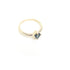Four Claw Round Blue Topaz in Yellow Gold
